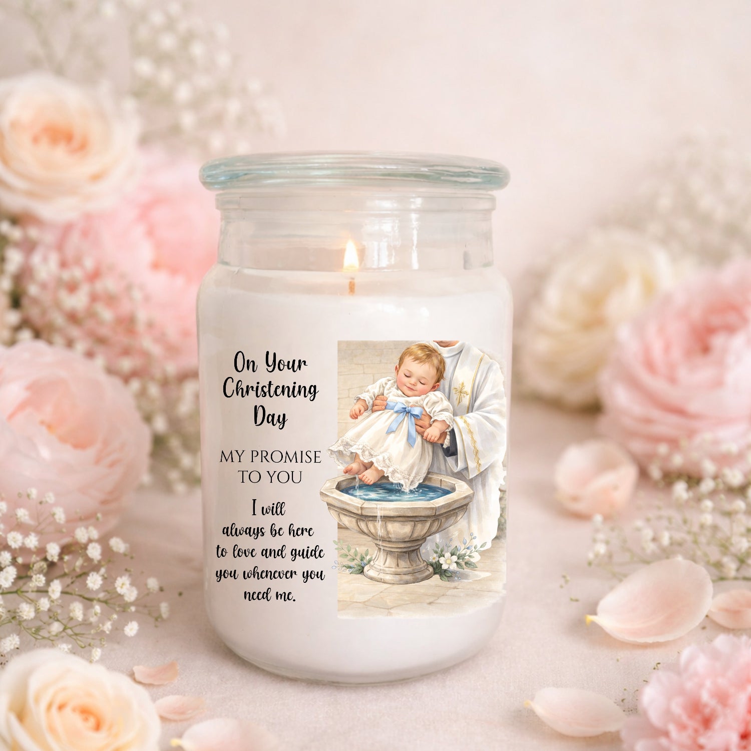 Candle jar with a religious design and text, surrounded by flowers on a light background