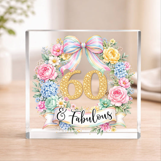 Clear Acrylic block with floral design and '60 & Fabulous' text on a wooden surface.