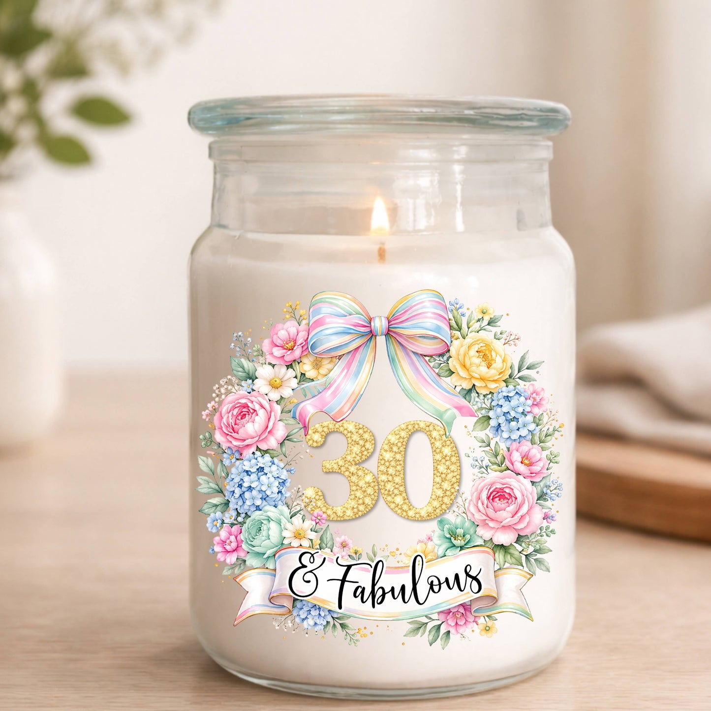 Decorative candle jar with '30 & Fabulous' design on a light background