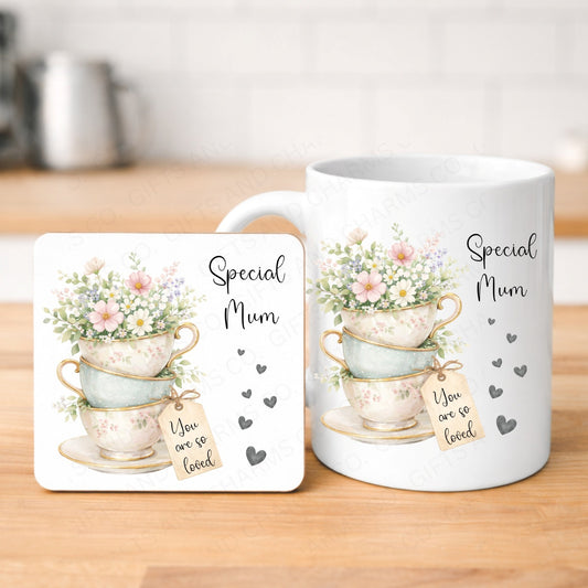 Mug and coaster set with floral design and 'Special Mum' text on a wooden surface.